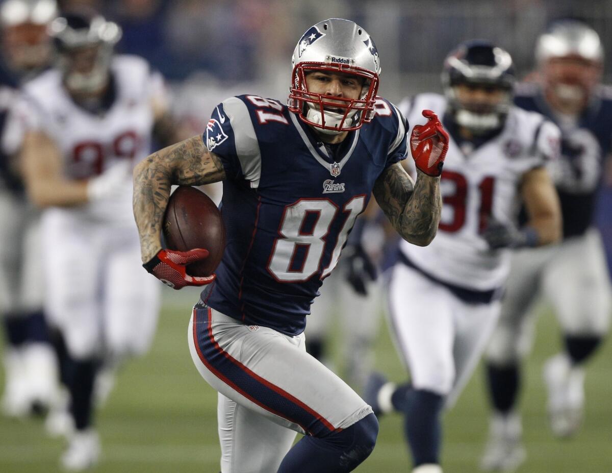 Former New England Patriots tight end Aaron Hernandez has been charged in the slaying of Odin Lloyd.