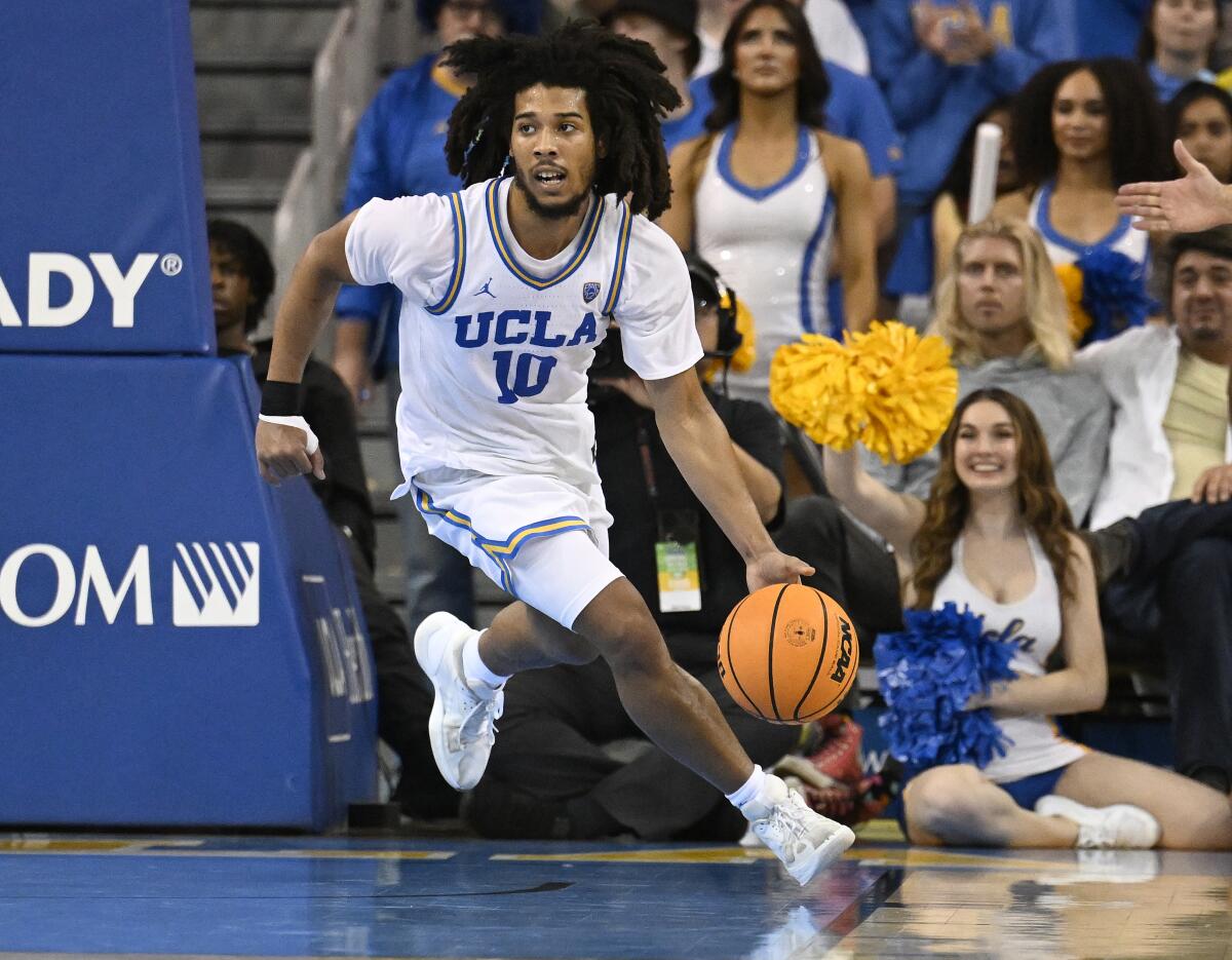 UCLA guard Tyger Campbell controls the ball during a win over Oregon on Sunday. 