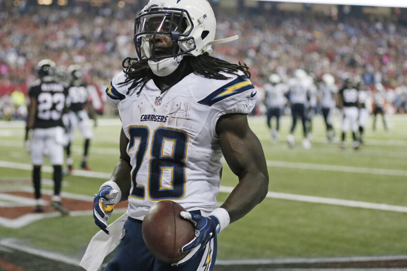 Chargers running back Melvin Gordon (28) runs into the end zone for a touchdown against the Falcons during the second half.