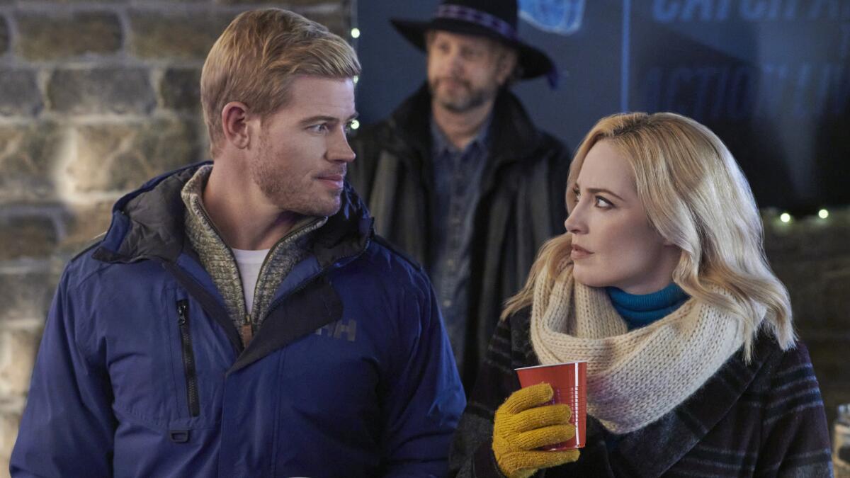 Trevor Donovan and Charlotte Sullivan in "Two for the Win" on Hallmark