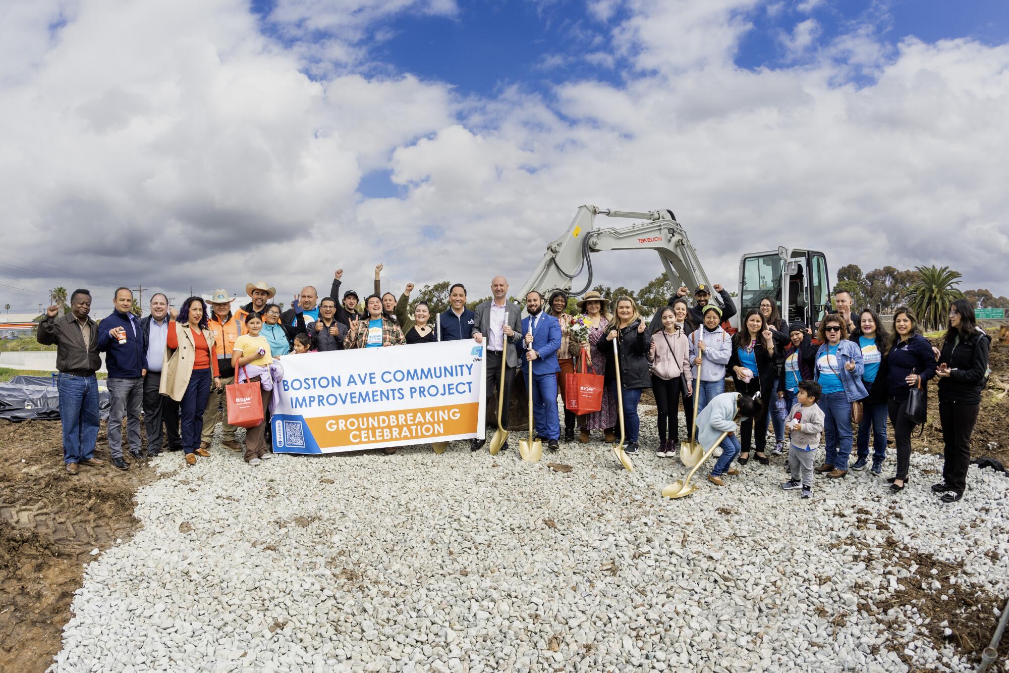 A group photo at a celebratory groundbreaking.