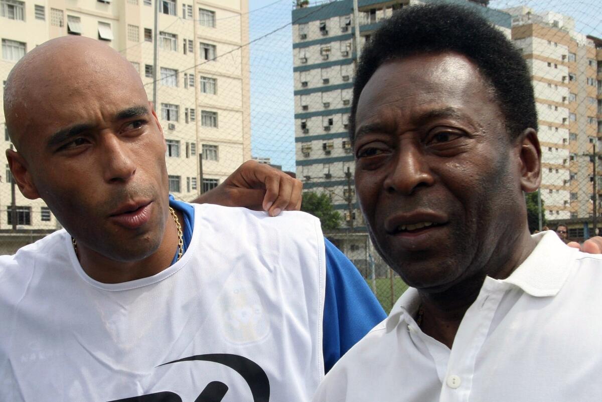 Edson Cholbi do Nascimento, known as Edinho, is shown in 2007 with his father, soccer legend Pelé. Edinho has been sentenced to 33 years in prison.