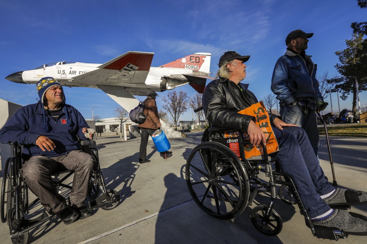 Homeless Army veterans hang out at Boeing Plaza in Lancaster during the 2020 homeless count
