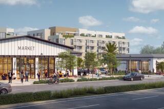 A rendering of the mixed-use development with retail and 218 apartments proposed for Carlsbad Village Drive.