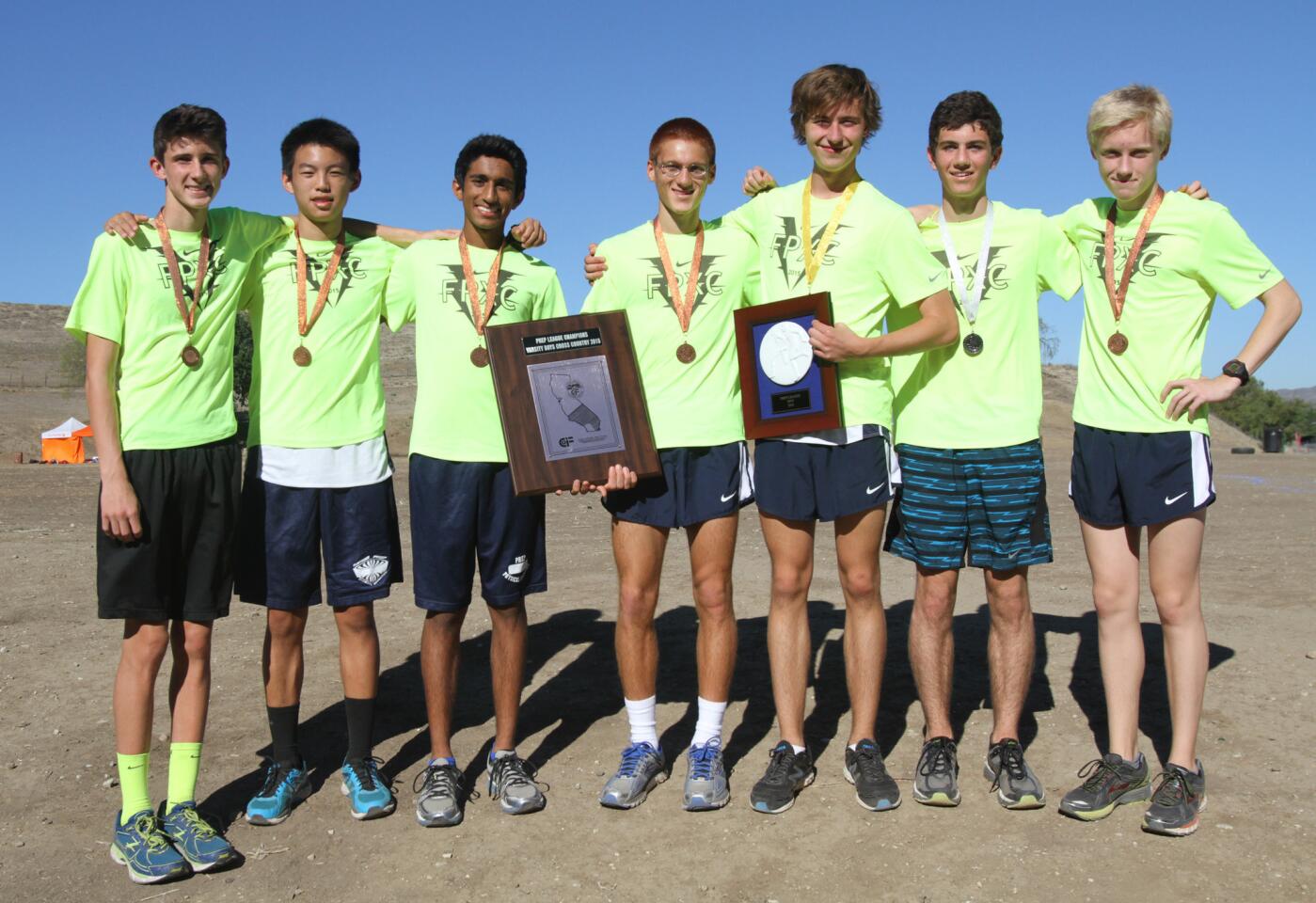 Flintridge Prep boys' varsity cross country runners, led by league MVP Jack Van Scoter, third from right, took the league title with runners finishing in the top five spots at the Prep League Cross Country Finals at Pierce College in Woodland Hills on Saturday, Oct. 31, 2015.