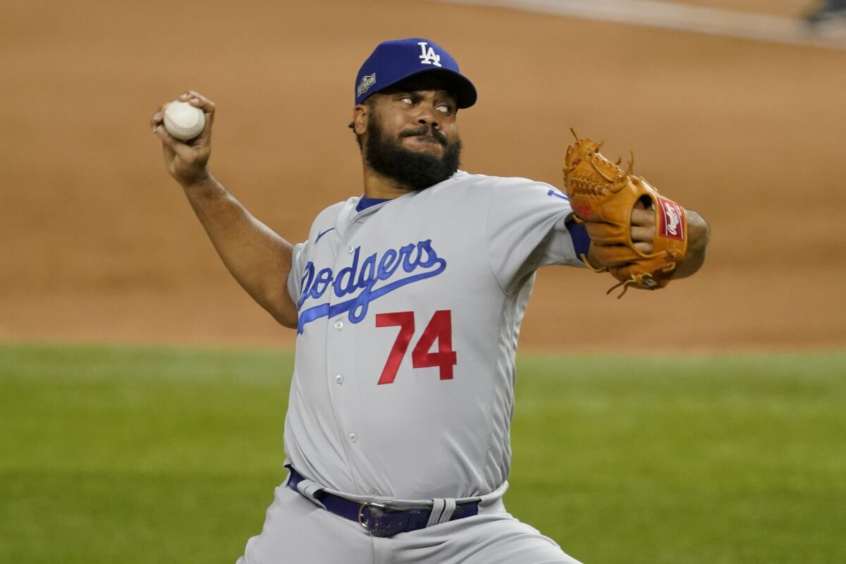 Dodgers relief pitcher Kenley Jansen throws against the Atlanta Braves in Game 3 of the NLCS.