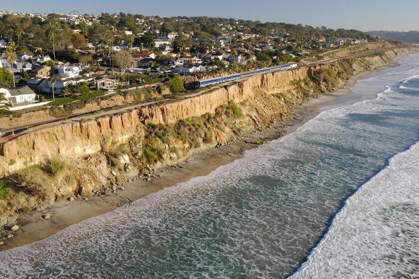 DEL MAR, CA. DEC 11, 2018,-For the fourth time this year the bluffs above the beach in Del Mar between 9th and 10th streets have stuffed off on to the beach below. Officials are worried that the continuing erosion is putting the train tracks that sit close to the cliffs edge in jeopardy. PHOTO/JOHN GIBBINS Staff photographer, San Diego Union-Tribune. ?2018