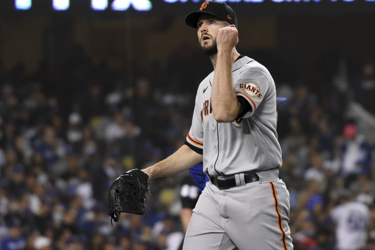 San Francisco Giants starting pitcher Alex Wood reacts after getting out of the fourth inning.