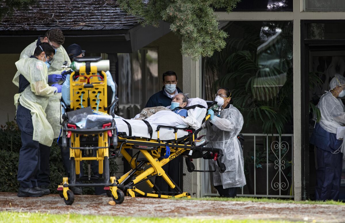A patient is removed from a Riverside nursing home amid a COVID-19 outbreak.