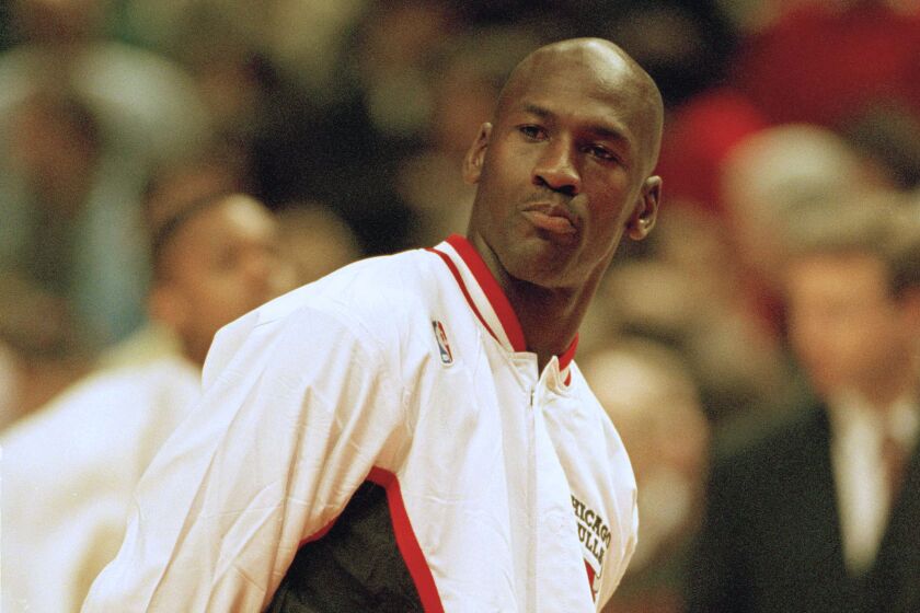 Chicago Bulls Guard Michael Jordan waits his turn to shoot during warm-ups before their game against the Orlando Magic, Friday, March 24, 1995, Chicago, Ill. (AP Photo/Roberto Borea)