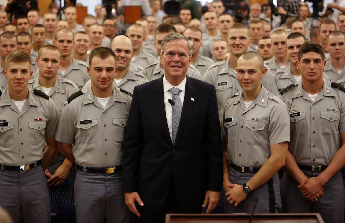 Republican presidential candidate, former Florida Gov. Jeb Bush, poses with cadets after giving a speech on foreign policy and national defense on the campus of The Citadel, Wednesday, Nov. 18, 2015, in Charleston, S.C.