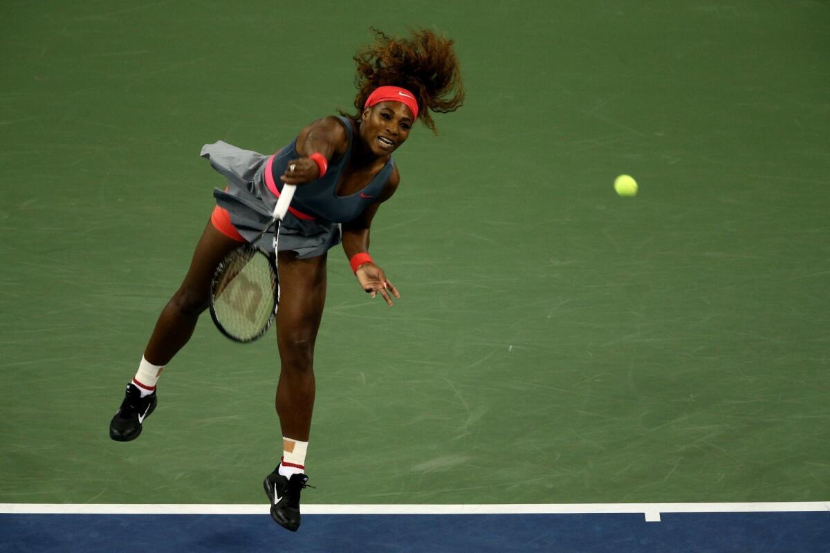 Serena Williams serves during her quarterfinal victory over Carla Suarez Navarro at the U.S. Open on Tuesday.