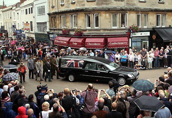 The hearse carrying Harry Patch, Britain's last surviving World War I soldier, drives through Wells, England, toward his funeral at Wells Cathedral. Patch died two weeks ago at age 111.