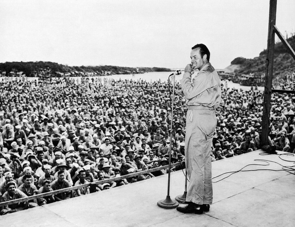 Bob Hope performs for U.S. troops in 1944, part of an influential career that crossed the 20th century.