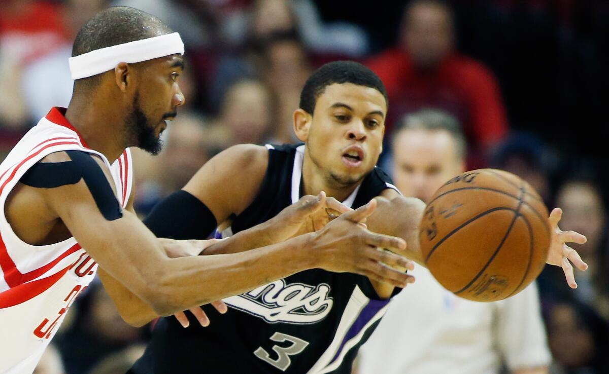 Ray McCallum Jr. (3) chases after a loose ball while a member of the Sacramento Kings against Rockets forward Corey Brewer. The California native has since played in China.