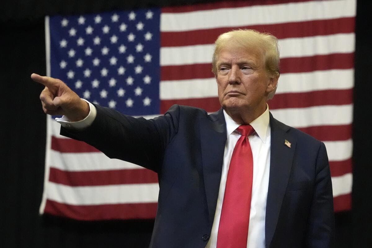 Former President Trump arrives to speak at a campaign rally in Bozeman, Mont., on Aug. 9.