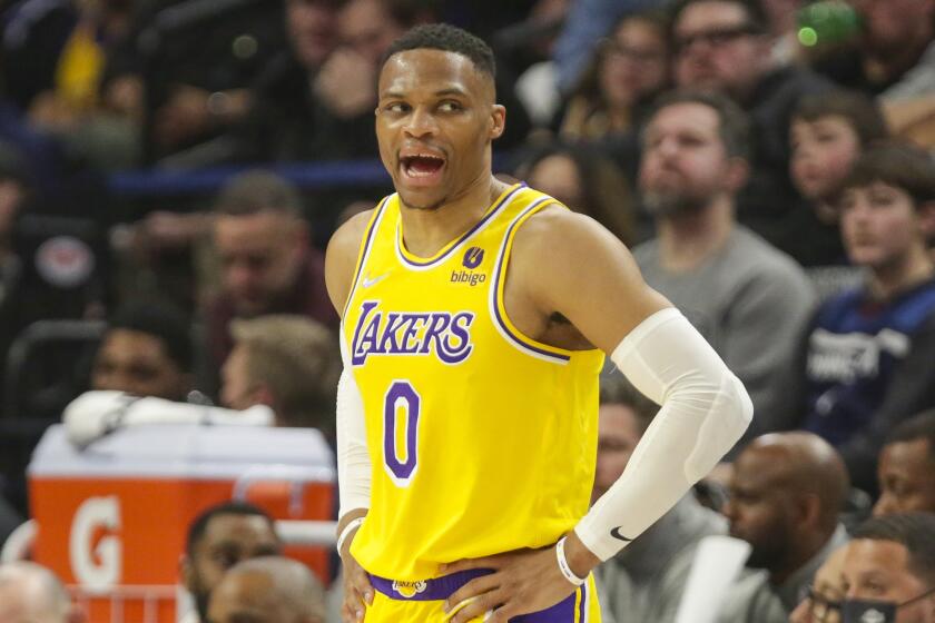 Los Angeles Lakers guard Russell Westbrook yells during an NBA basketball game.
