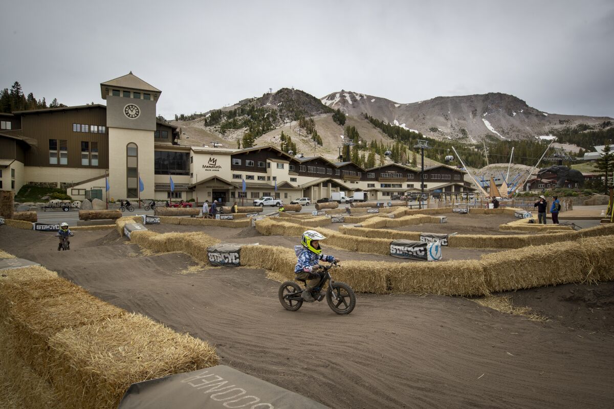 Young mountain bikers ride a course near the Mammoth Mountain resorts.