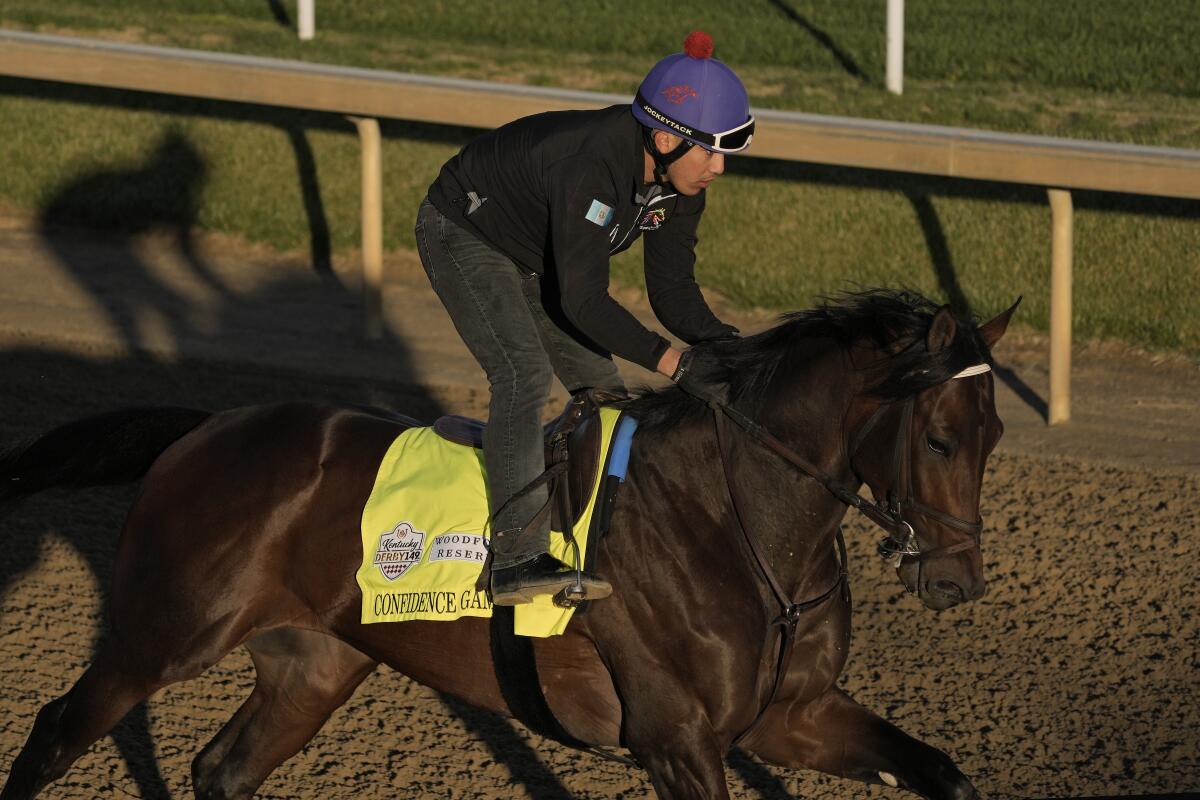 Kentucky Derby hopeful Confidence Game works out at Churchill Downs on Wednesday.