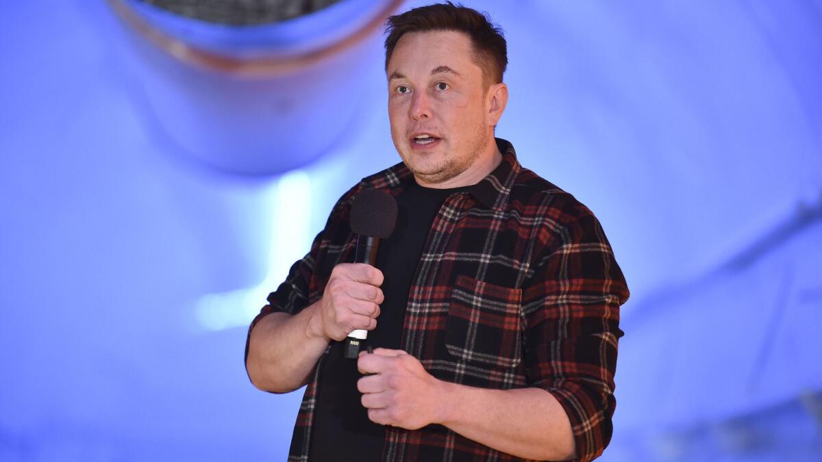 Elon Musk, shown Dec. 18, is arguing in court that when he called cave explorer Vernon Unsworth a "pedo" and a "child rapist," reasonable people knew he was expressing opinions rather than stating facts.
