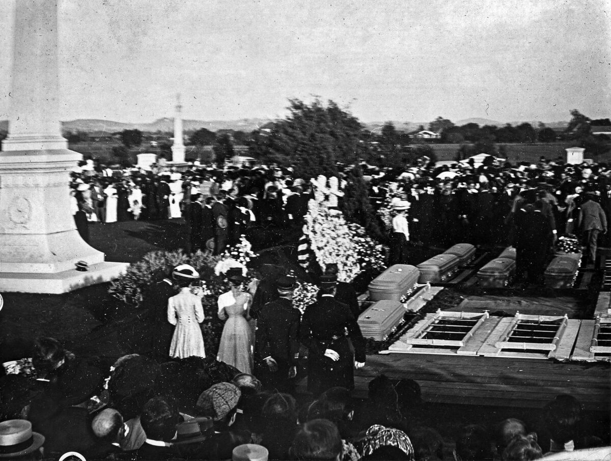 Oct. 9, 1910: Burial of bombing victims at what is now Hollywood Forever Cemetery. The monument in the background is to Gen. Harrison Gray Otis' wife, Eliza.