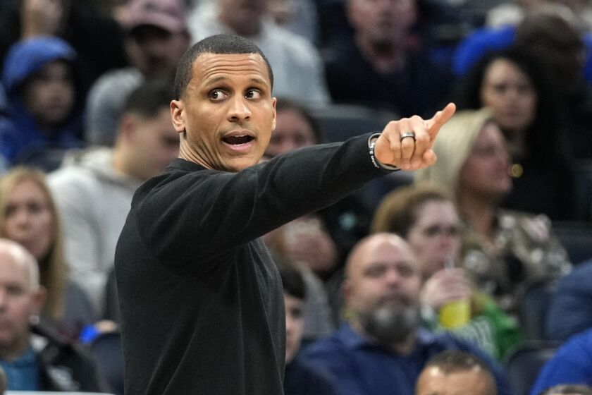 Boston Celtics head coach Joe Mazzulla directs his players on the court during the first half of an NBA basketball game against the Orlando Magic, Monday, Jan. 23, 2023, in Orlando, Fla. (AP Photo/John Raoux)