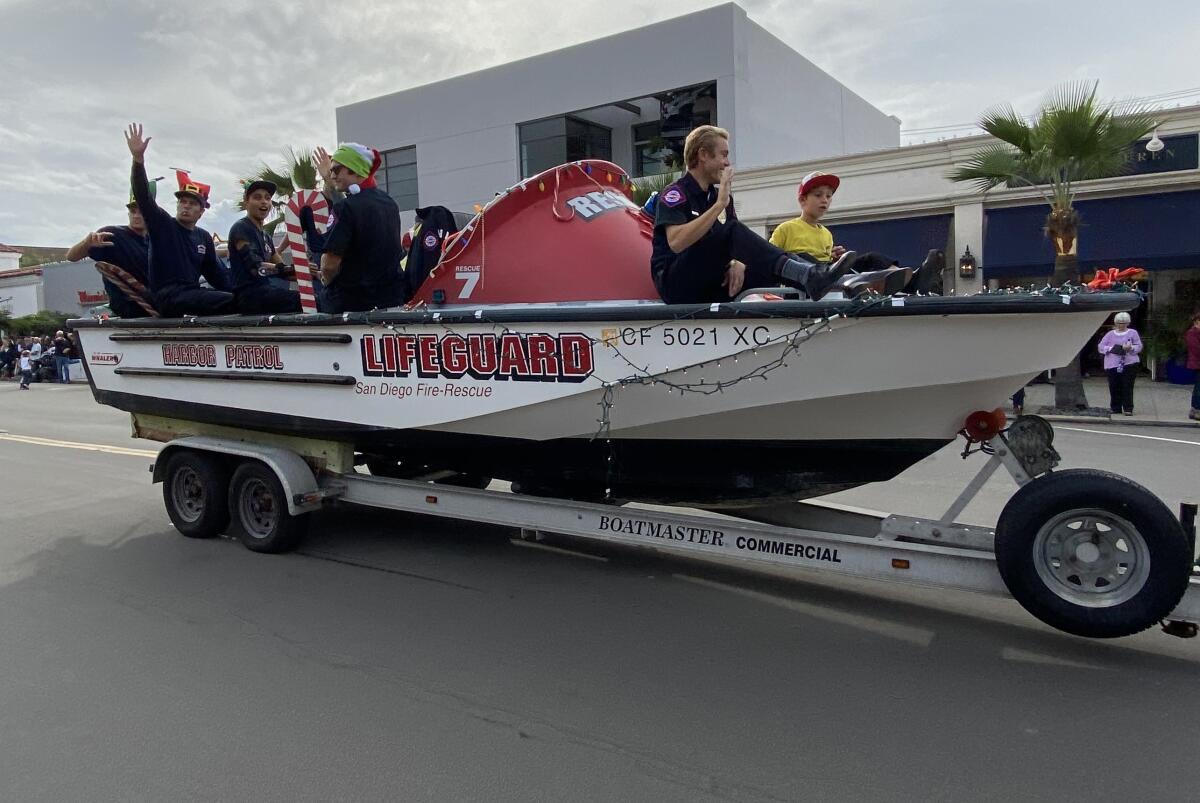 The San Diego Lifeguards’ float earns the most community spirit award.