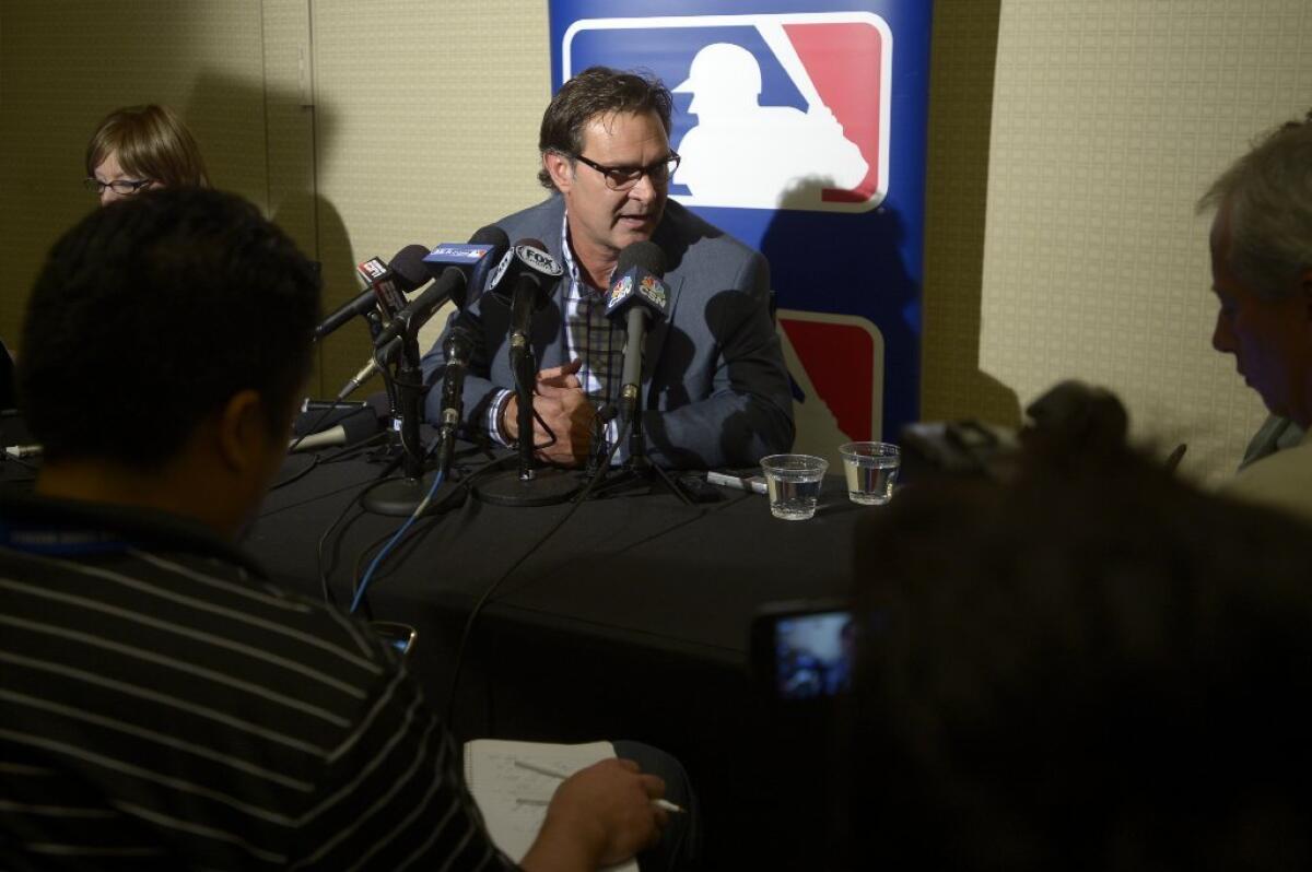 Dodgers Manager Don Mattingly answers questions during winter meetings in Lake Buena Vista, Fla. on Tuesday.