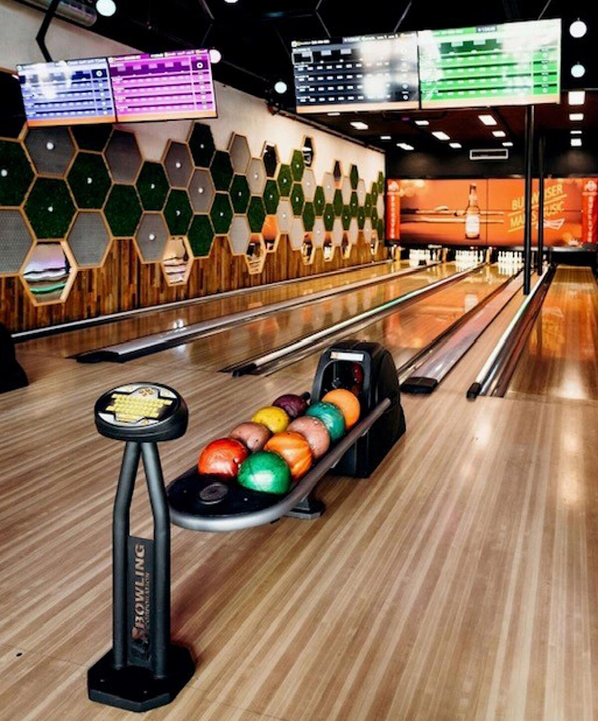 There is a four-lane bowling alley inside Break Point Pacific Beach.