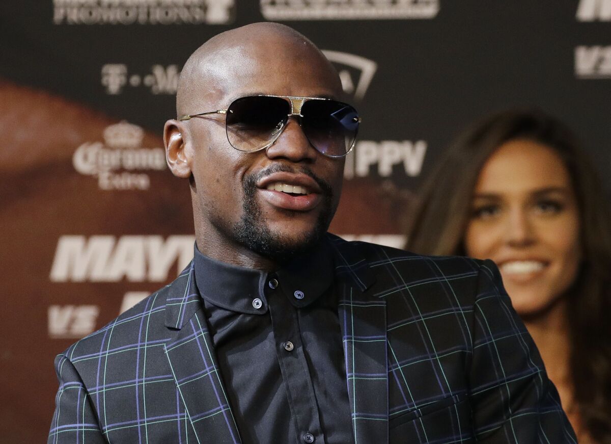 Floyd Mayweather Jr. attends a news conference Aug. 23 in Las Vegas.