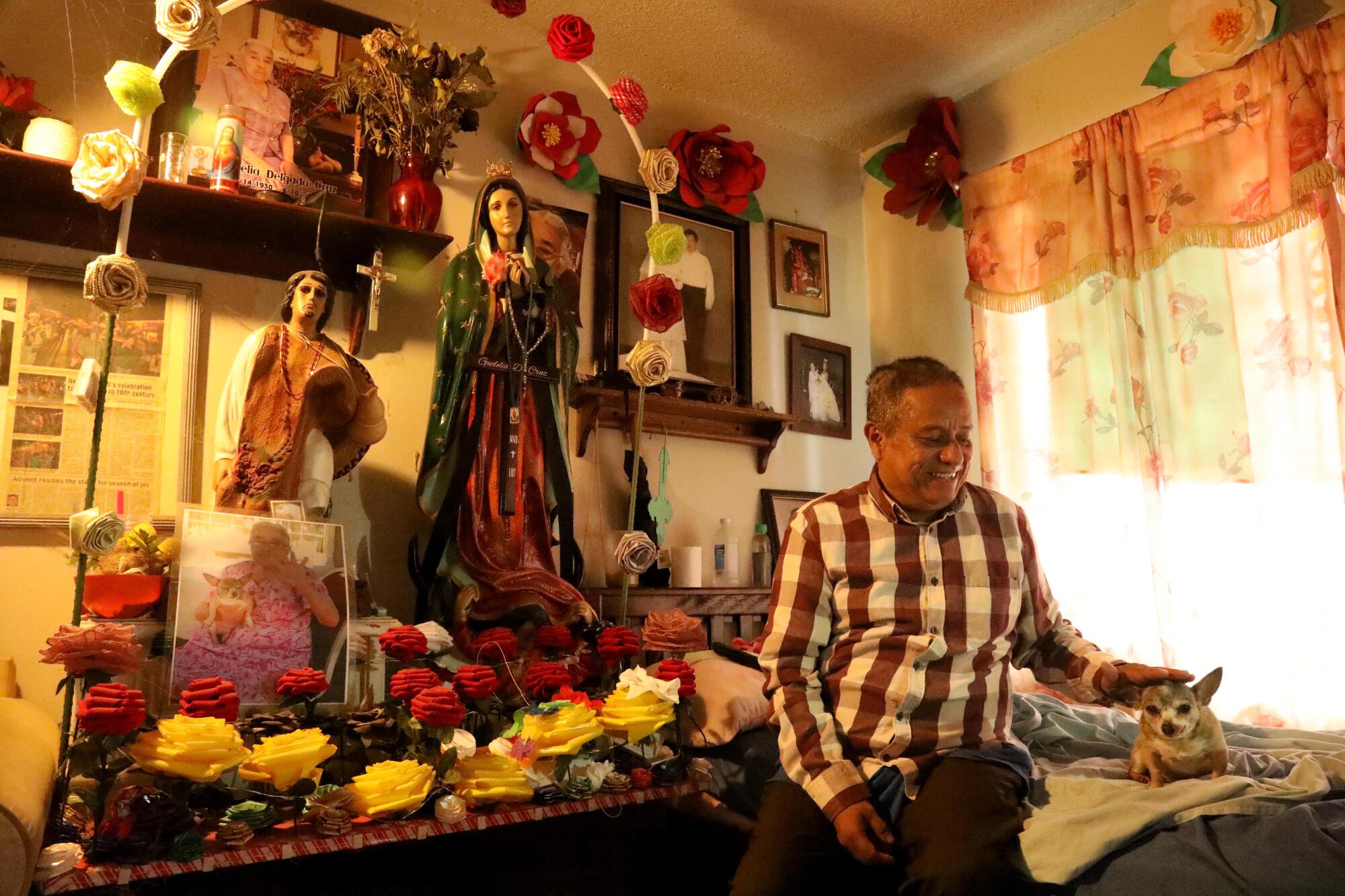 Hilario Herrera is shown inside his apartment in the Oak View neighborhood in Huntington Beach. 