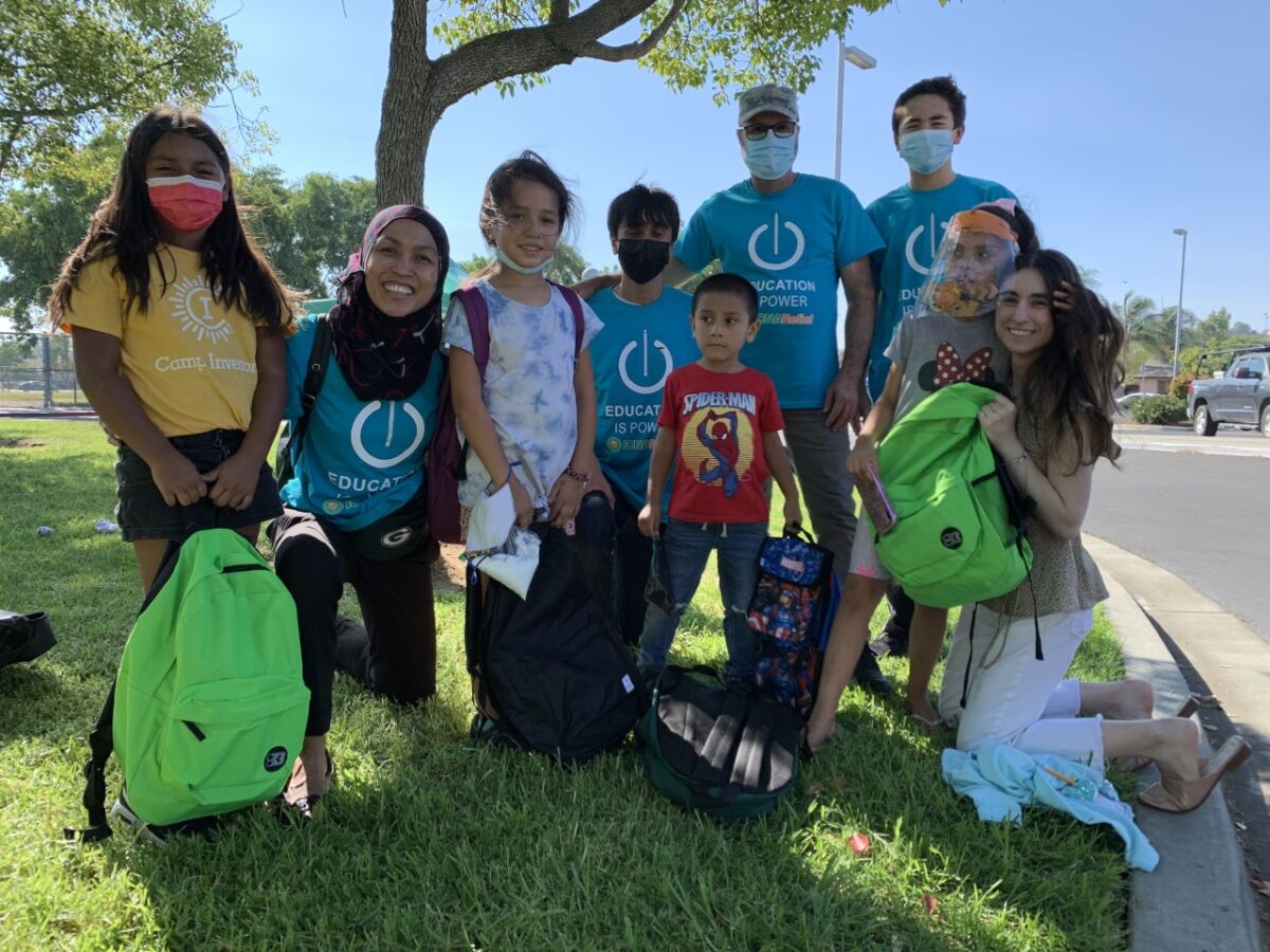 Volunteers and recipients of the backpack giveaway at Farr Elementary School in Escondido, sponsored by ICNA Relief USA.