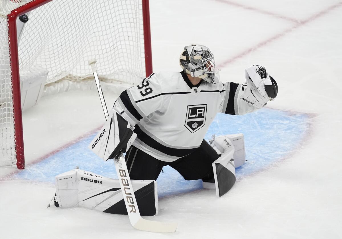 Kings goaltender Cam Talbot gives up a goal to Colorado forward Logan O'Connor during the first period Friday.