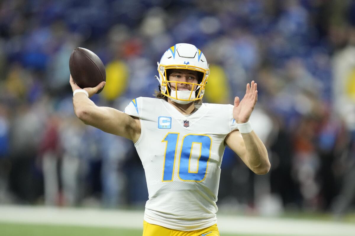 Chargers quarterback Justin Herbert throws before a game Dec. 26, 2022.