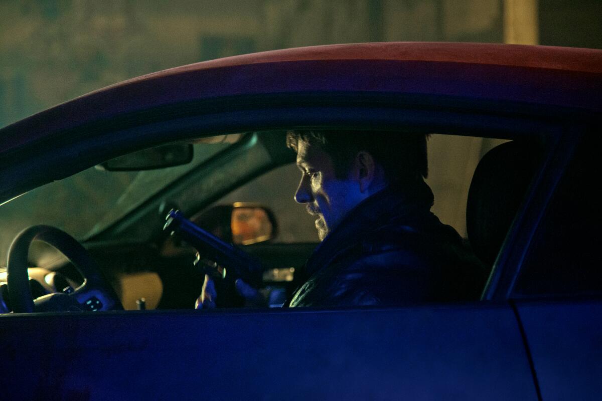 Joel Kinnaman as Godlock in Silent Night. Photo Credit: Carlos Latapi