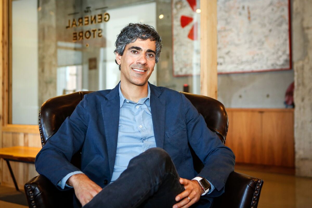 In this image provided by Yelp, Yelp CEO Jeremy Stoppelman poses in 2019 in the company's former headquarters in San Francisco. (Amy Osborne/Yelp via AP)