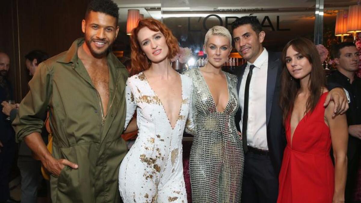 "UnREAL's" Jeffrey Bowyer-Chapman, from left, Breeda Wool of "UnREAL" and "Mr. Mercedes," Serinda Swan of "Inhumans" and "Ballers" and guests at party.