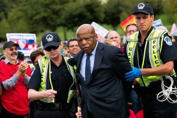 Congressman John Lewis is arrested by U.S. Capitol Police during a protest calling for immigration reform