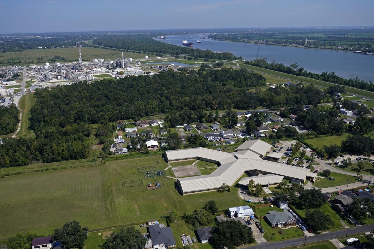 An aerial view of an elementary school and residential neighborhoods near the Denka Performance Elastomer Plant.