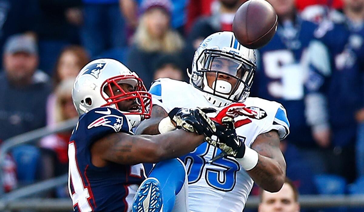 Patriots cornerback Darrelle Revis (24) breaks up a pass intended for Lions receiver Eric Ebron in the third quarter Sunday.