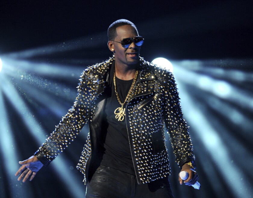 FILE - R. Kelly performs at the BET Awards on June 30, 2013, in Los Angeles. The jailed R&B singer wants to shake up his legal defense team two months before he is set to go on trial in New York on federal racketeering charges. His top two attorneys, Steve Greenberg and Michael Leonard, of Chicago, filed a motion this week seeking to withdraw from the long-delayed case, saying it would be “impossible” for them “to properly represent Mr. Kelly under the current circumstances.” (Photo by Frank Micelotta/Invision/AP, File)