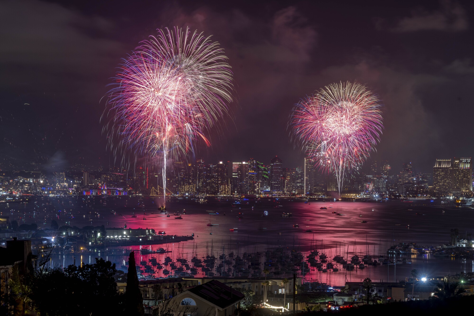 Fireworks explode over San Diego Bay during the Big Bay Boom fireworks show in celebration of Independence Day.