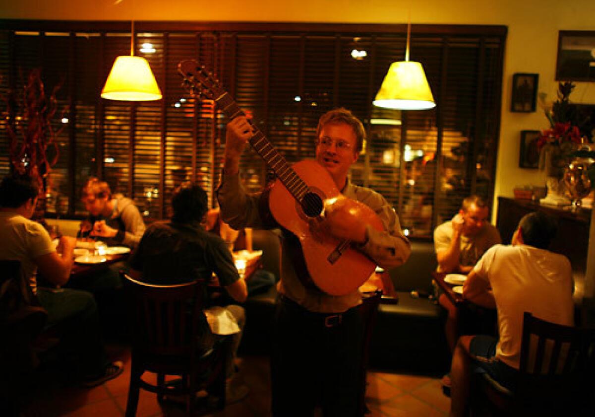 "Mateo" plays for the customers at Michelangelo in Silver Lake.