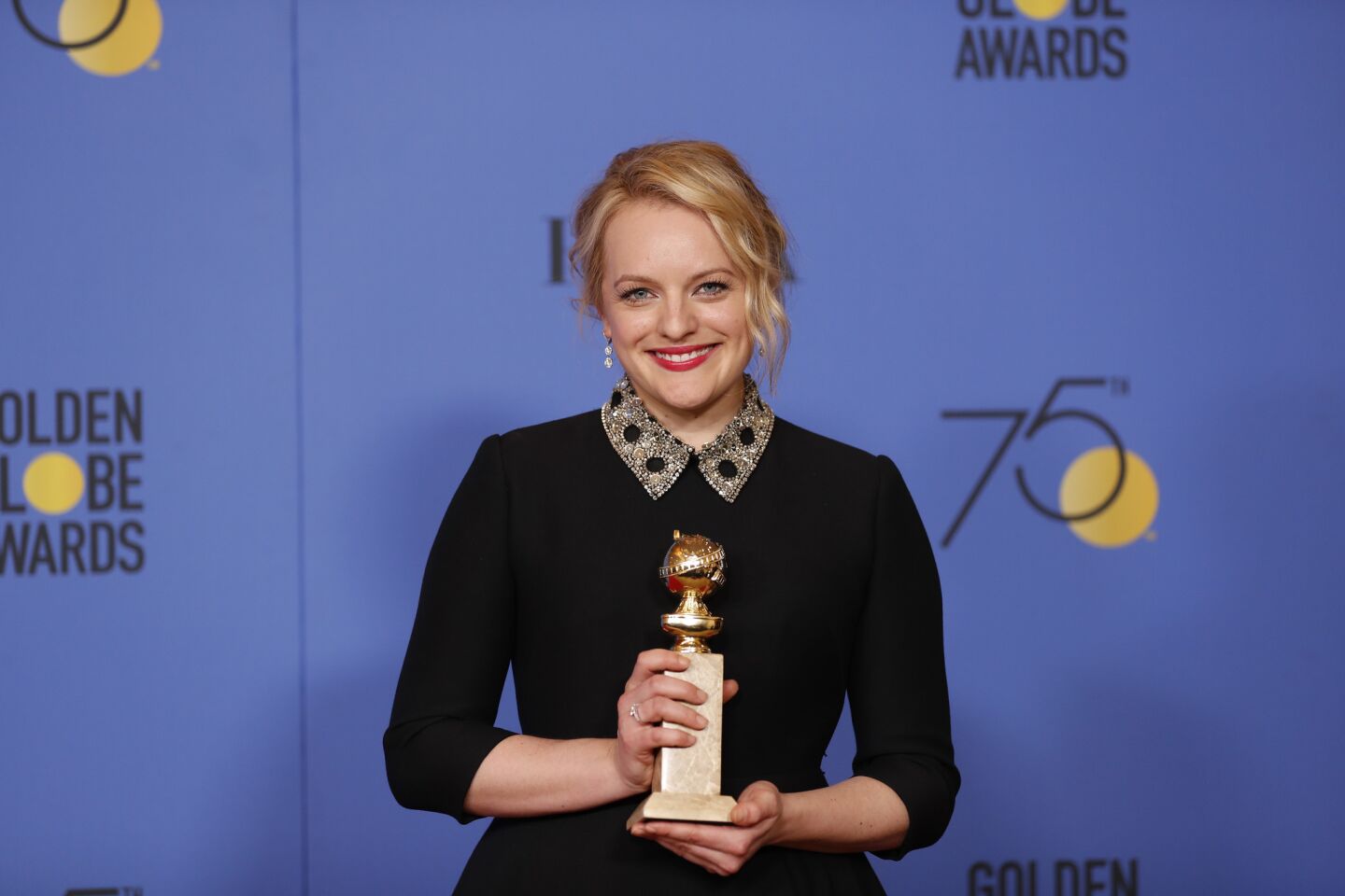 Elisabeth Moss won the lead actress TV drama award for the "The Handmaid's Tale."