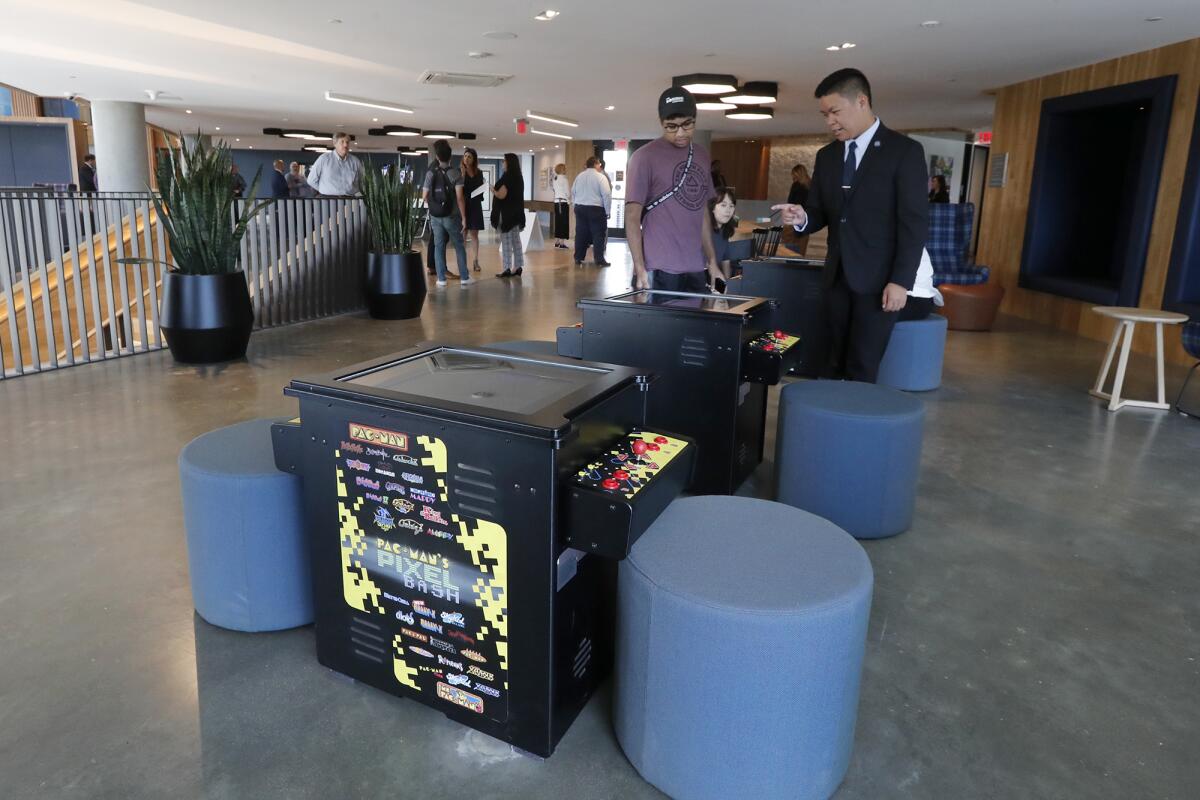 Three video game consoles are in the community center at the Plaza Verde student residence hall at UC Irvine.