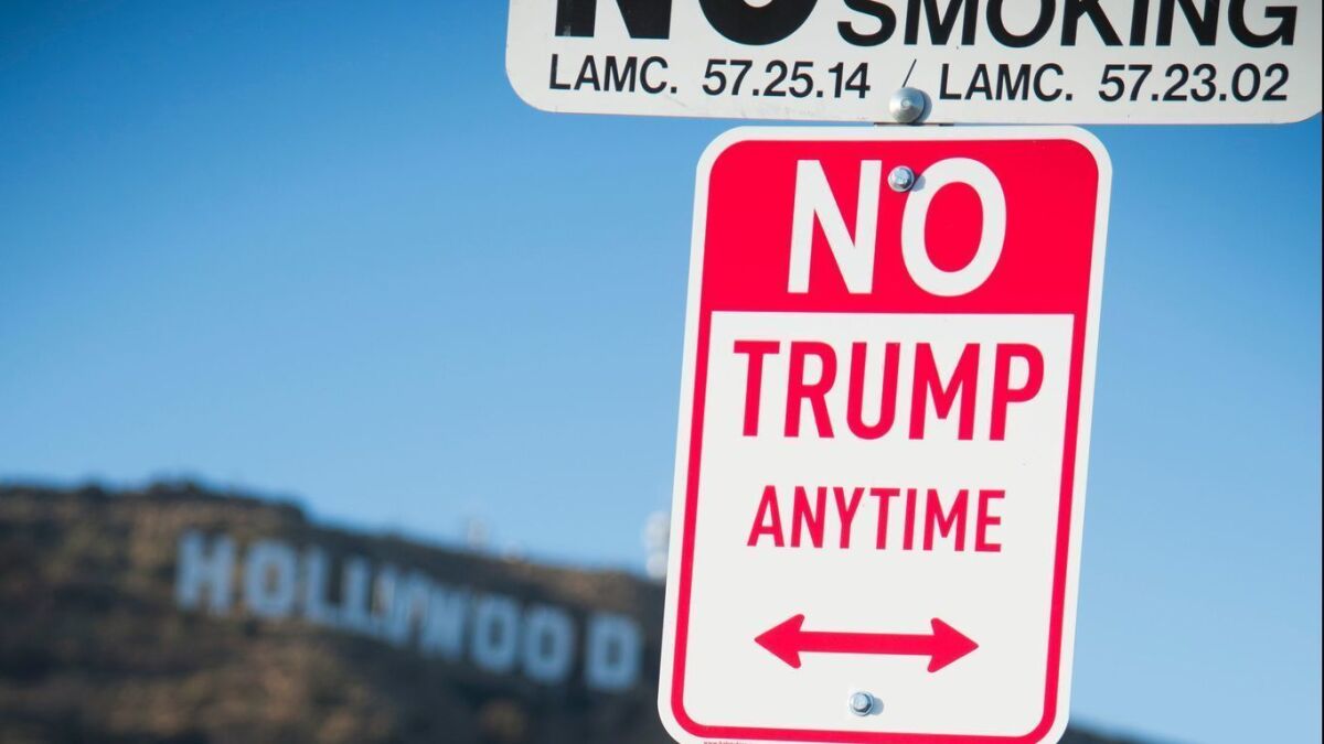A sign reading "No Trump Anytime" near the "Hollywood" sign in Los Angeles on April 27, 2016.