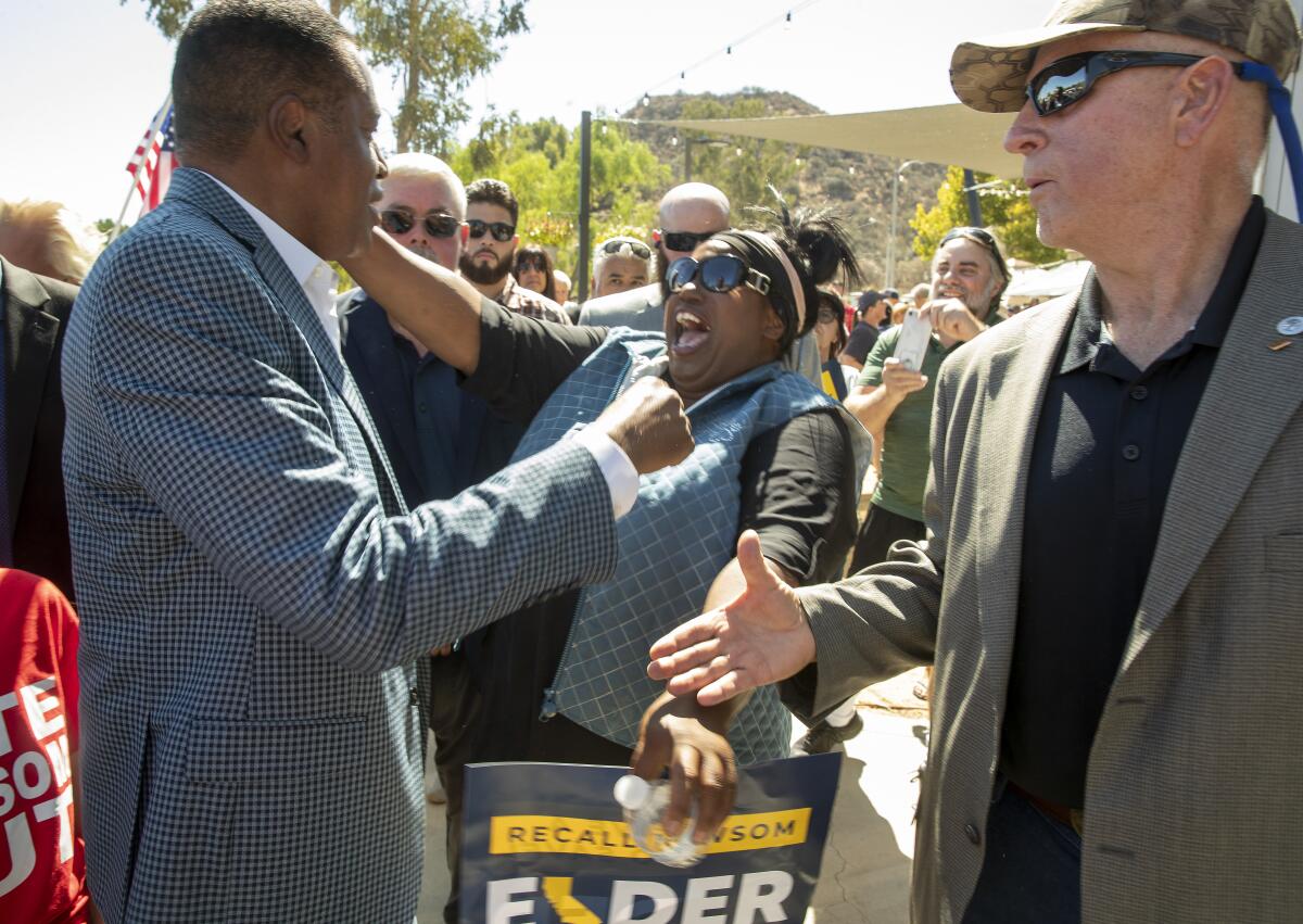 Gubernatorial candidate Larry Elder greets supporter.  