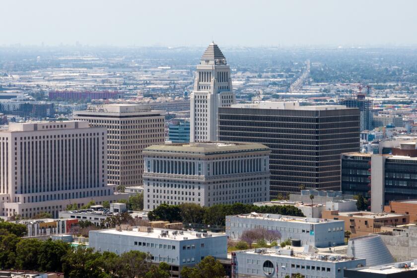 LOS ANGELES, CA - JUNE 23: Buildings left to right: Los Angeles Superior Court at the United States Courthouse; James K. Hahn City Hall East; Hall of Justice; Los Angeles City Hall (tall) and Clara Shortridge Foltz Criminal Justice Center. Photographed in Los Angeles, CA on Friday, June 23, 2023. (Myung J. Chun / Los Angeles Times)