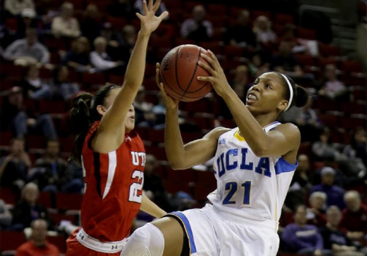 UCLA's Nirra Fields (21) puts up a shot against Utah's Danielle Rodriguez.