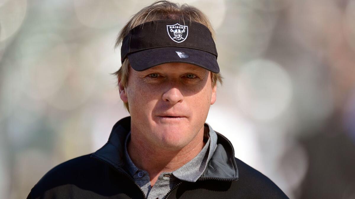 Jon Gruden looks on during warmups before a game between the Oakland Raiders and New Orleans Saints on Nov. 18, 2012, in Oakland.